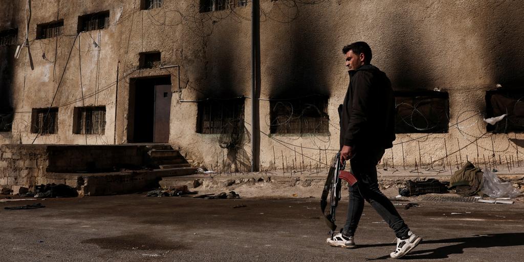 At least 14 members of Syria's new Interior Ministry killed in 'ambush'